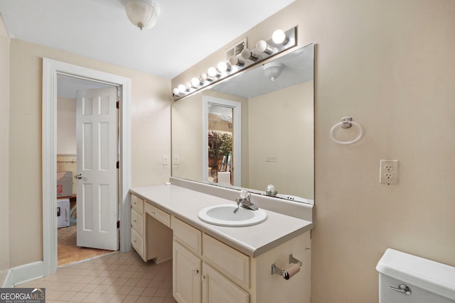 207 Saddle Mountain Rd SE, Rome, GA 30161 - bathroom with vanity, toilet, and tile patterned flooring