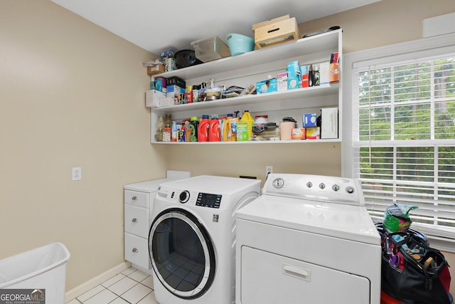 207 Saddle Mountain Rd SE, Rome, GA 30161 - laundry area featuring washer and clothes dryer, light tile patterned floors, and baseboards