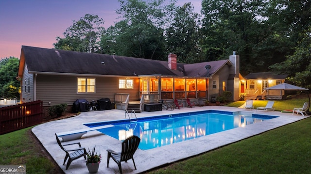 207 Saddle Mountain Rd SE, Rome, GA 30161 - swimming pool featuring a wooden deck, a diving board, and a patio