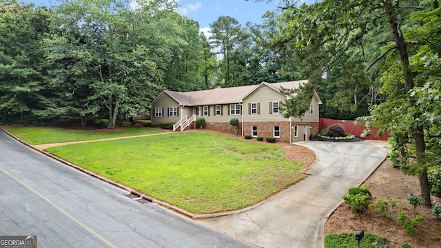 207 Saddle Mountain Rd SE, Rome, GA 30161 - ranch-style home featuring driveway, brick siding, and an attached garage