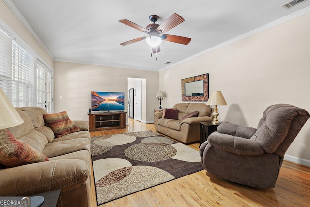 207 Saddle Mountain Rd SE, Rome, GA 30161 - living room featuring wood finished floors, ceiling fan, crown molding, and baseboards
