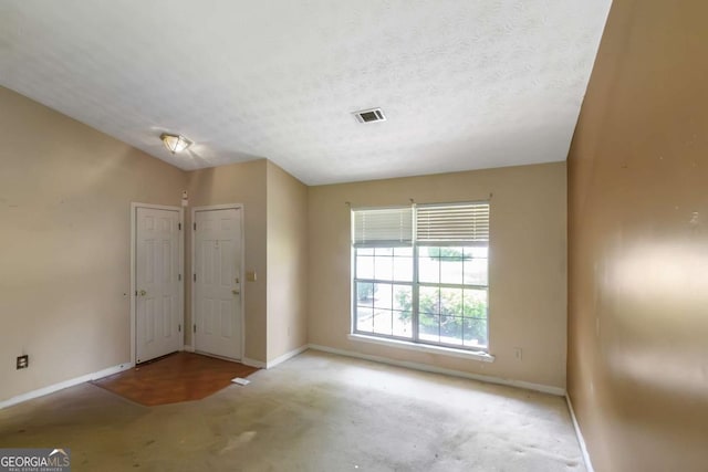 9550 Canvasback Ct, Jonesboro, GA 30238 - foyer entrance featuring baseboards and carpet floors