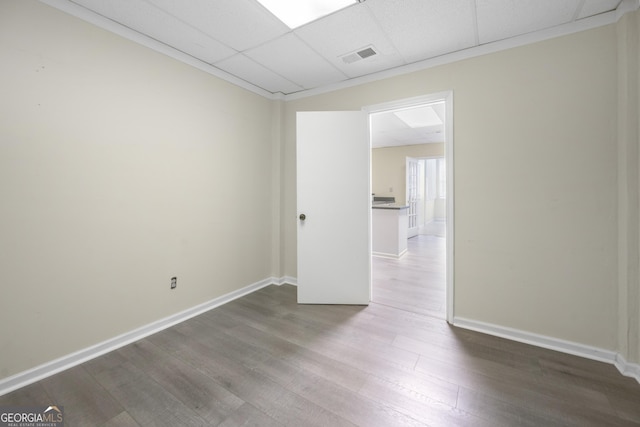 5065 Nesbit Ferry Ln, Atlanta, GA 30350 - spare room featuring a drop ceiling and wood finished floors