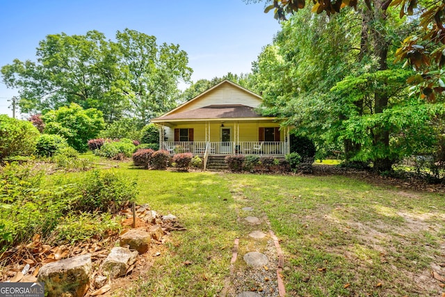 2037 Jeff Davis Rd, Thomaston, GA 30286 - view of front of house featuring covered porch and a front yard