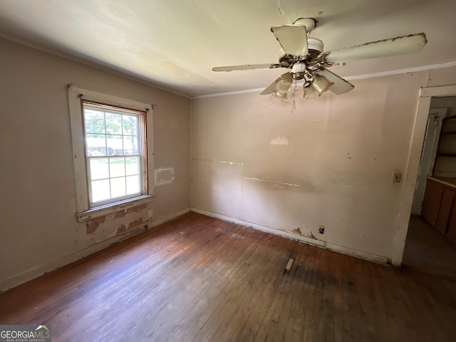1263 Highland Ave, Macon, GA 31211 - unfurnished room featuring hardwood / wood-style flooring, ceiling fan, baseboards, and ornamental molding