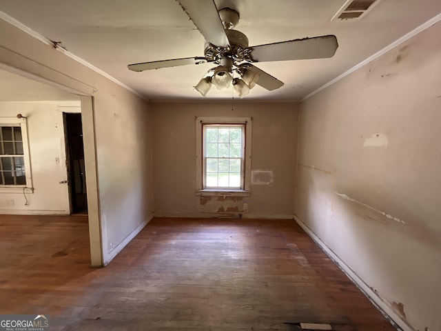 1263 Highland Ave, Macon, GA 31211 - spare room with ceiling fan, wood finished floors, crown molding, and baseboards