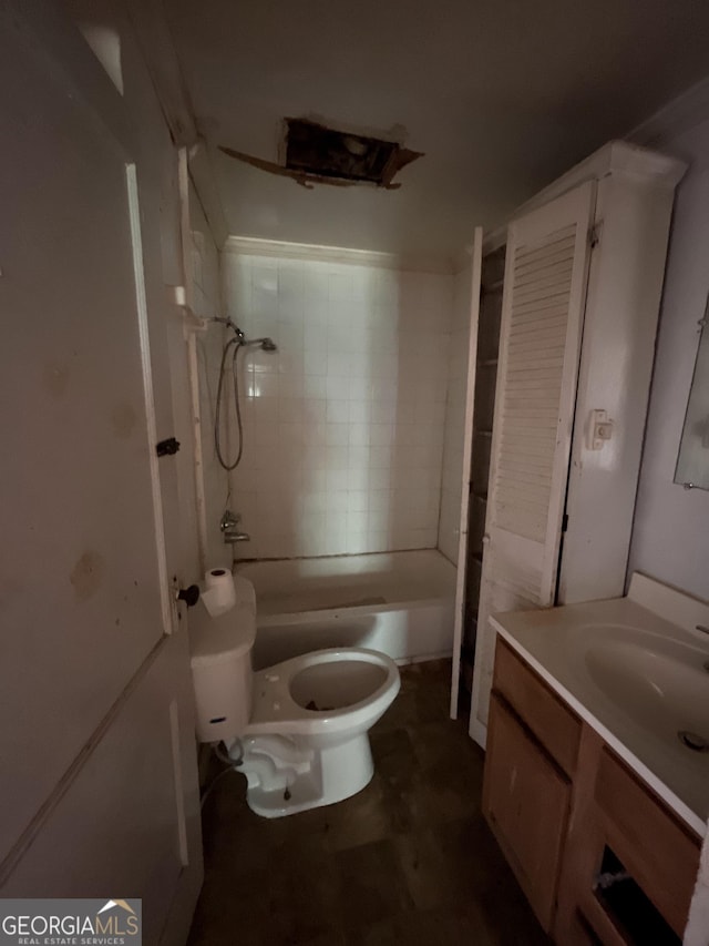 1263 Highland Ave, Macon, GA 31211 - bathroom featuring vanity, toilet, and bathing tub / shower combination