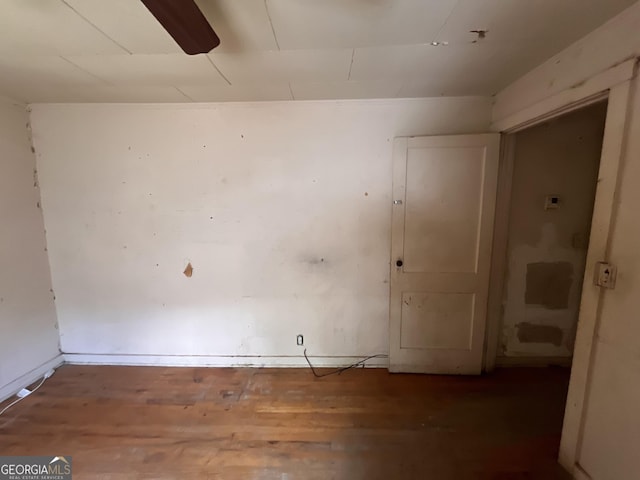 1263 Highland Ave, Macon, GA 31211 - empty room with wood finished floors and baseboards