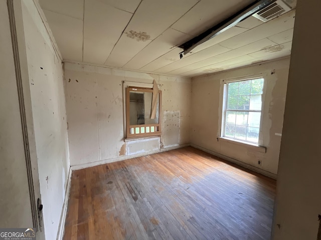 1263 Highland Ave, Macon, GA 31211 - spare room featuring hardwood / wood-style flooring