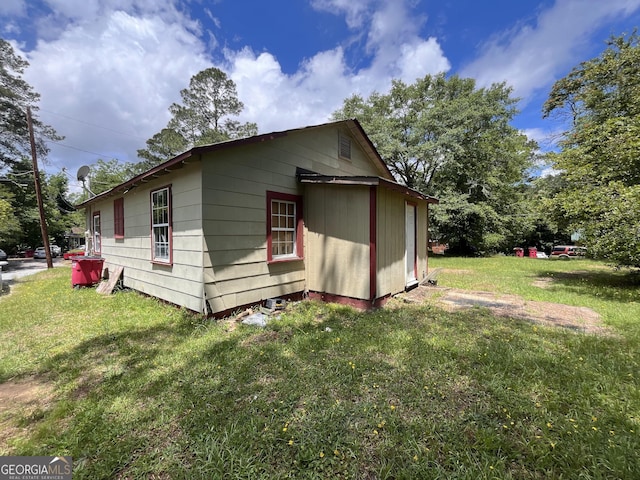 1263 Highland Ave, Macon, GA 31211 - view of home's exterior featuring a lawn