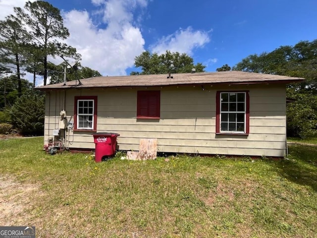 1263 Highland Ave, Macon, GA 31211 - rear view of house with a yard