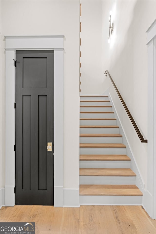 4927 Slaton Dr, Acworth, GA 30101 - stairway with wood finished floors