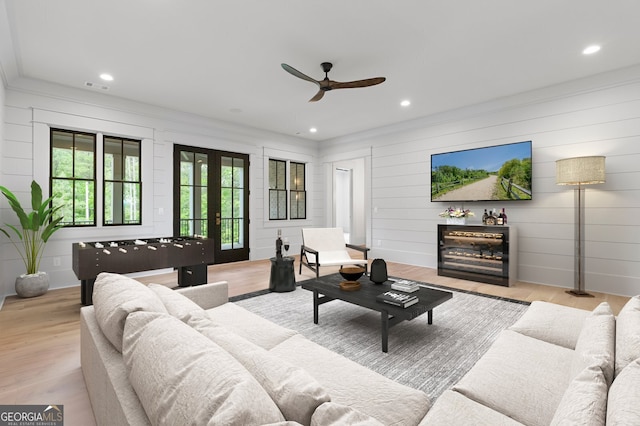 4927 Slaton Dr, Acworth, GA 30101 - living area with ceiling fan, ornamental molding, wood finished floors, and recessed lighting
