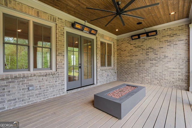 4927 Slaton Dr, Acworth, GA 30101 - deck featuring an outdoor fire pit, ceiling fan, and french doors