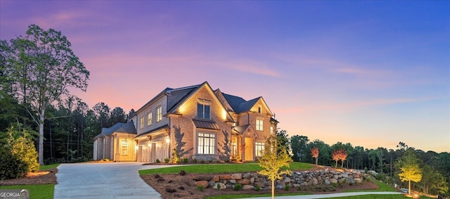 4927 Slaton Dr, Acworth, GA 30101 - english style home featuring concrete driveway and a yard