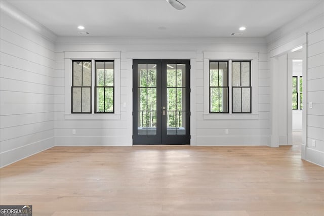 4927 Slaton Dr, Acworth, GA 30101 - foyer entrance featuring french doors, plenty of natural light, crown molding, wood finished floors, and recessed lighting