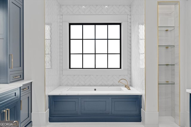 4927 Slaton Dr, Acworth, GA 30101 - bathroom featuring a garden tub and vanity