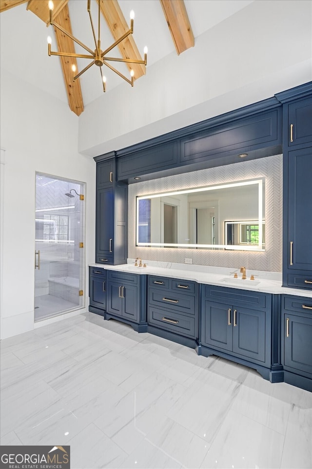 4927 Slaton Dr, Acworth, GA 30101 - bathroom with a chandelier, double vanity, beam ceiling, a stall shower, and marble finish floors