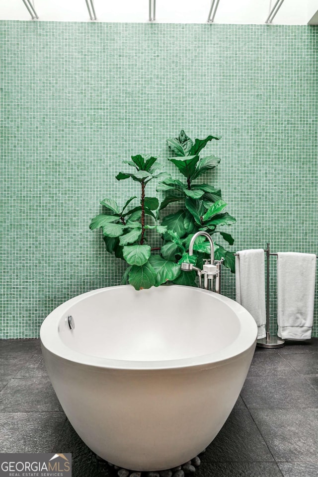 1933 Mclendon Ave NE Unit A, Atlanta, GA 30307 - full bathroom featuring tile walls and a freestanding tub