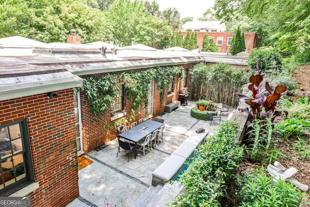 1933 Mclendon Ave NE Unit A, Atlanta, GA 30307 - view of patio featuring outdoor dining space