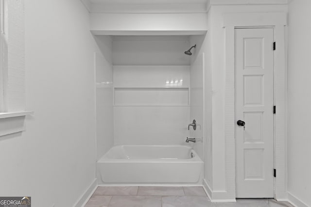 8129 S Giles Rd, Douglasville, GA 30135 - bathroom featuring bathing tub / shower combination and baseboards