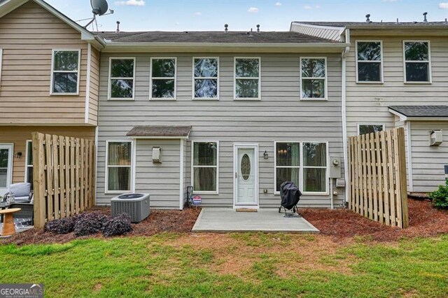 411 Mountain View Ln, Woodstock, GA 30188 - rear view of property with central AC unit and a patio