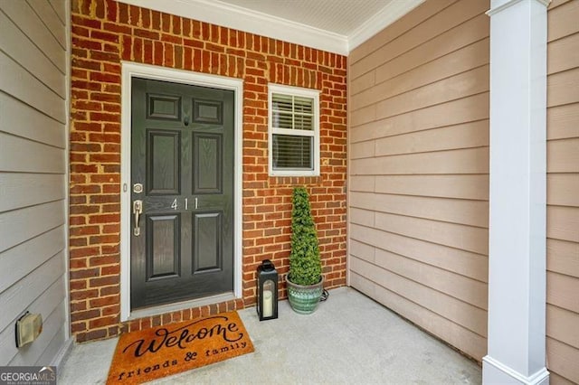 411 Mountain View Ln, Woodstock, GA 30188 - view of exterior entry with a porch and brick siding