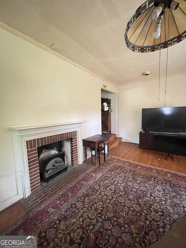 2742 Forest Ridge Dr, Macon, GA 31204 - living area with wood finished floors and crown molding