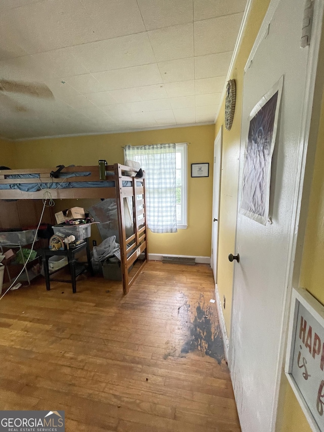 2742 Forest Ridge Dr, Macon, GA 31204 - bedroom featuring hardwood / wood-style floors