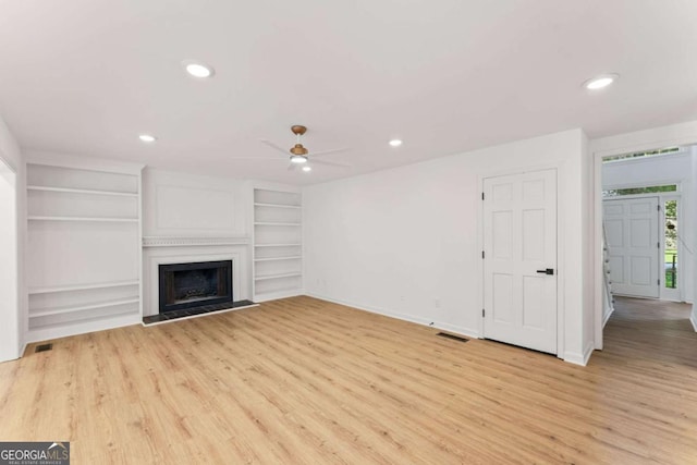3878 Brookside Pkwy, Decatur, GA 30034 - unfurnished living room with ceiling fan, light wood-style floors, recessed lighting, baseboards, and a fireplace