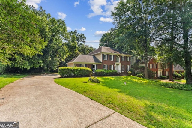 3878 Brookside Pkwy, Decatur, GA 30034 - colonial-style house featuring a front lawn and concrete driveway