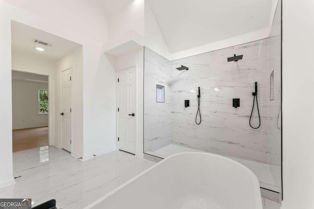3878 Brookside Pkwy, Decatur, GA 30034 - bathroom featuring a freestanding bath, a marble finish shower, and baseboards