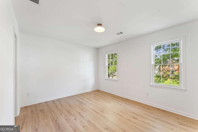 3878 Brookside Pkwy, Decatur, GA 30034 - empty room featuring light wood-type flooring and baseboards