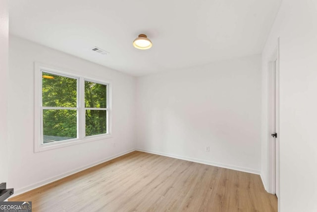 3878 Brookside Pkwy, Decatur, GA 30034 - spare room with light wood-style floors and baseboards