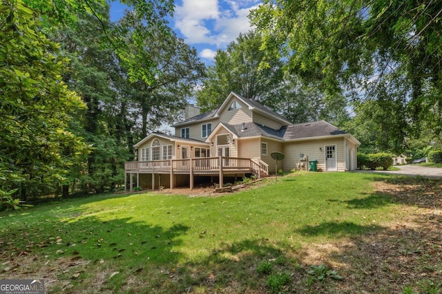 3878 Brookside Pkwy, Decatur, GA 30034 - back of house featuring a wooden deck, a lawn, and a chimney