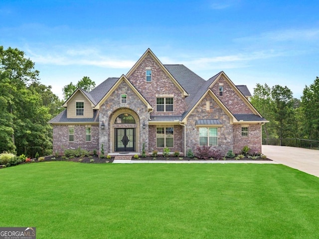 7519 Waterview Cv, Douglasville, GA 30135 - craftsman-style house featuring a front yard, brick siding, and roof with shingles