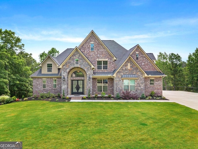 7519 Waterview Cv, Douglasville, GA 30135 - craftsman house with a front lawn and brick siding