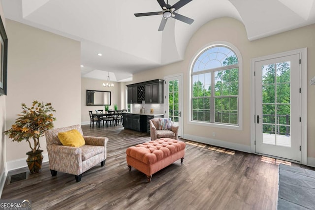 7519 Waterview Cv, Douglasville, GA 30135 - living room featuring vaulted ceiling, baseboards, wood finished floors, a chandelier, and recessed lighting