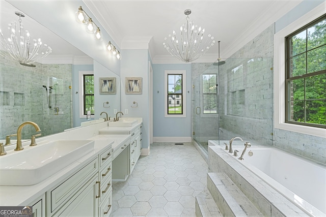 7519 Waterview Cv, Douglasville, GA 30135 - bathroom featuring a chandelier, a shower stall, double vanity, a garden tub, and crown molding