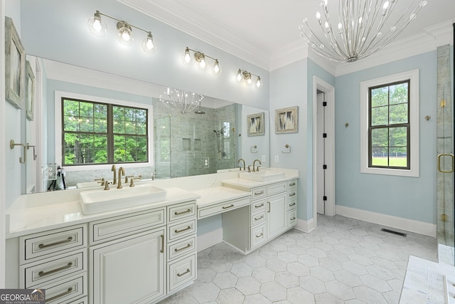 7519 Waterview Cv, Douglasville, GA 30135 - full bathroom with a chandelier, double vanity, a shower stall, ornamental molding, and tile patterned flooring