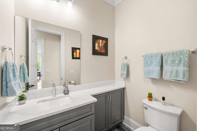7519 Waterview Cv, Douglasville, GA 30135 - half bath featuring vanity, toilet, and baseboards
