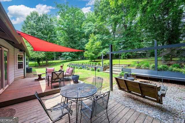609 Hearth Pl, Lawrenceville, GA 30043 - wooden terrace with outdoor dining space, outdoor lounge area, and a lawn