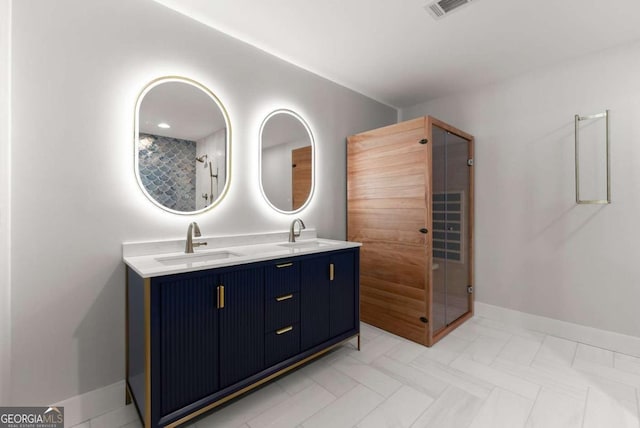 4690 Giddon Martin Rd, Gainesville, GA 30506 - bathroom with double vanity and baseboards