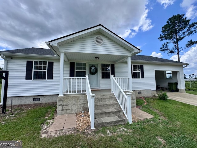 309 Ralph Wommack Rd, Hazlehurst, GA 31539 - bungalow-style house featuring crawl space, a front yard, covered porch, and a shingled roof