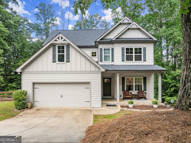 79 Brynbrooke Ct, Dawsonville, GA 30534 - view of front of house with a porch, a shingled roof, driveway, and board and batten siding