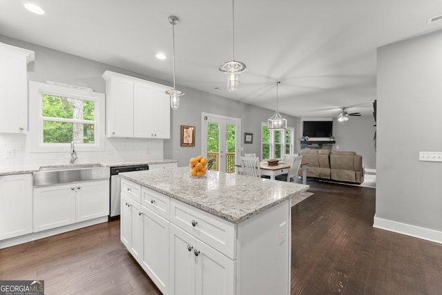 79 Brynbrooke Ct, Dawsonville, GA 30534 - kitchen featuring dishwasher, a sink, recessed lighting, open floor plan, and backsplash