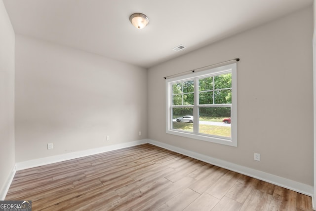79 Brynbrooke Ct, Dawsonville, GA 30534 - empty room with light wood finished floors and baseboards