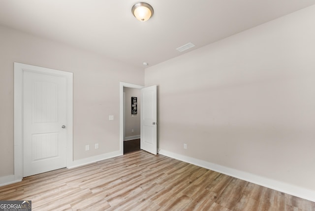 79 Brynbrooke Ct, Dawsonville, GA 30534 - unfurnished bedroom with light wood-type flooring and baseboards