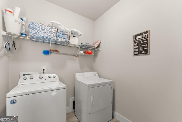 79 Brynbrooke Ct, Dawsonville, GA 30534 - laundry area with washing machine and dryer and baseboards