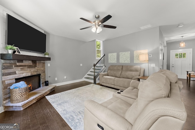 79 Brynbrooke Ct, Dawsonville, GA 30534 - living area featuring stairway, dark wood-style floors, baseboards, a ceiling fan, and a fireplace